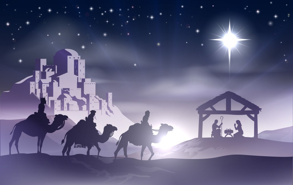 Christmas Christian nativity scene with baby Jesus in the manger in silhouette, three wise men or kings and star of Bethlehem with the city of Bethlehem in the distance